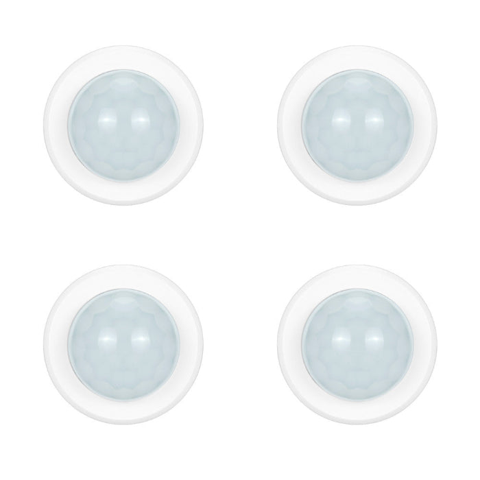 Four white round light fixtures with clear lenses on a white background