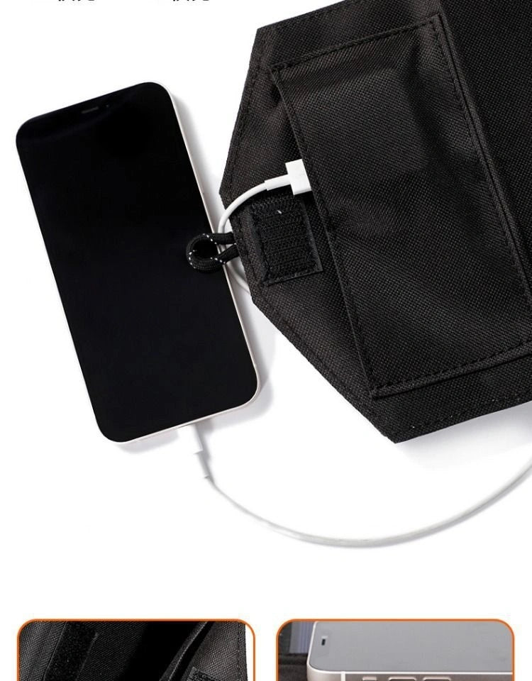 Black phone case with a phone and charging cable on a white background