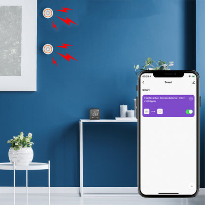 Smart device app on a smartphone with a blue wall and white tables in the background