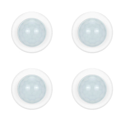 Four white round light fixtures with clear lenses on a white background